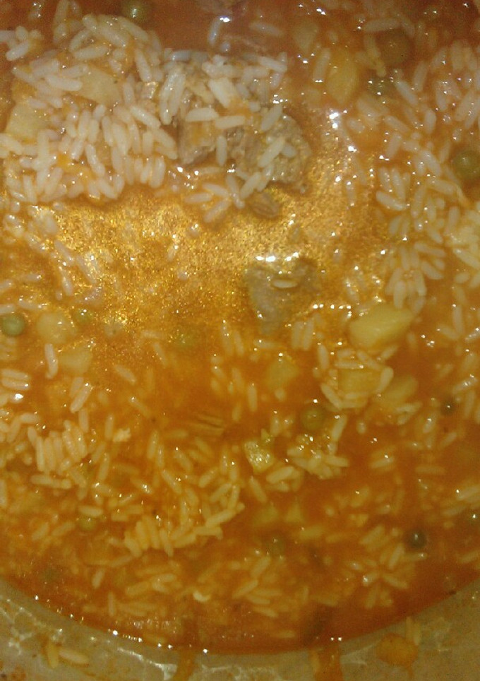 Una foto de Guiso de arroz con arvejas