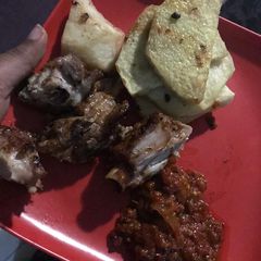 A picture of Fried Yam and Pepper sauce `.