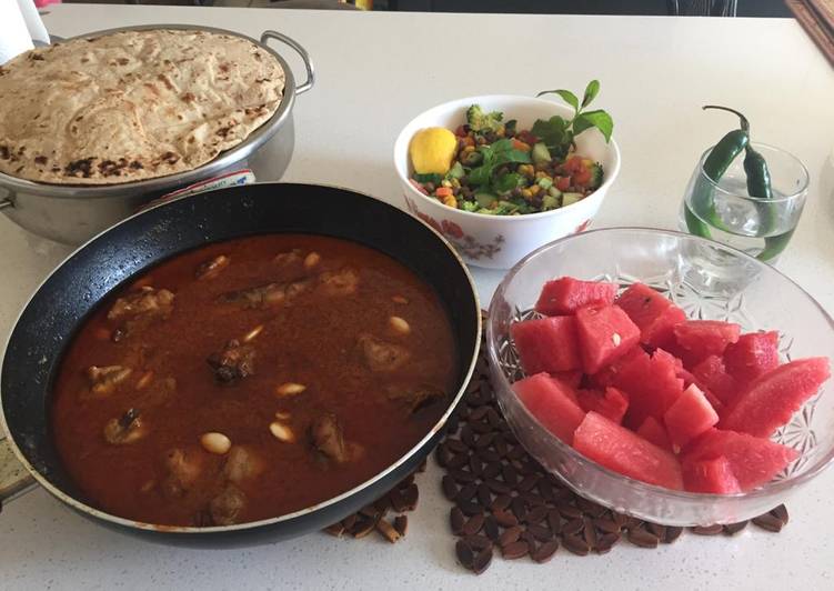 Chicken qorma with kachumar salad and roti