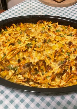 Une photo de Gratin de spätzles à l’ananas, fromage et petits légumes