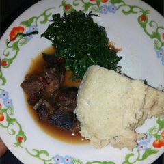 A picture of Ugali,beef, veges.