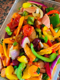 A picture of Chicken sauce with veggies.