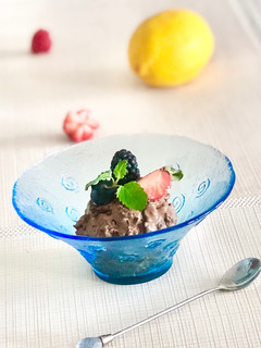A picture of Homemade dark chocolate ice cream with rum raisins and nuts - or simply create your own flavors🍦😋.