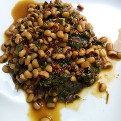 A picture of Beans porridge with moringa.