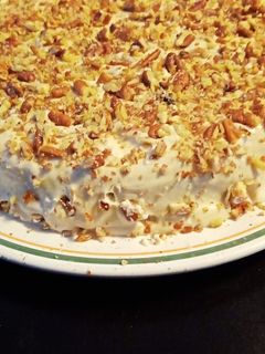 Una foto de Pastel de zanahoria con betún de queso