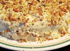 Una foto de Pastel de zanahoria con betún de queso