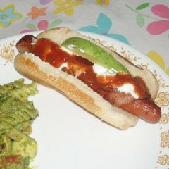 A picture of Bacon Wrapped Mexican Hotdogs.
