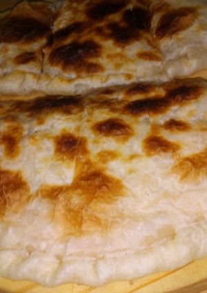 Una foto de Calzone de pollo y verdeo