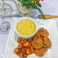 A picture of Pap & akara bean balls with sweet plantain (Breakfast).