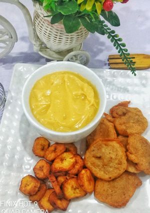 A picture of Pap & akara bean balls with sweet plantain (Breakfast).
