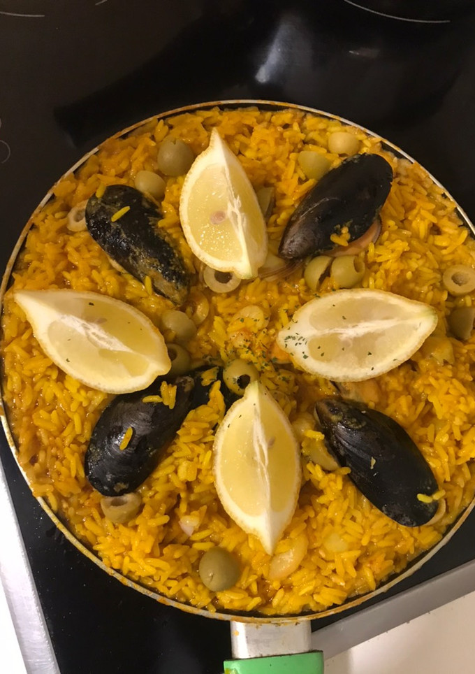 Una foto de Paella