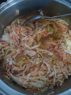 Una foto de Tinga de pollo con col