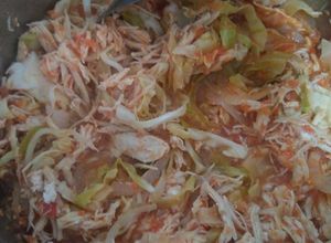 Una foto de Tinga de pollo con col