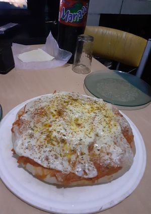 Una foto de Pizza
