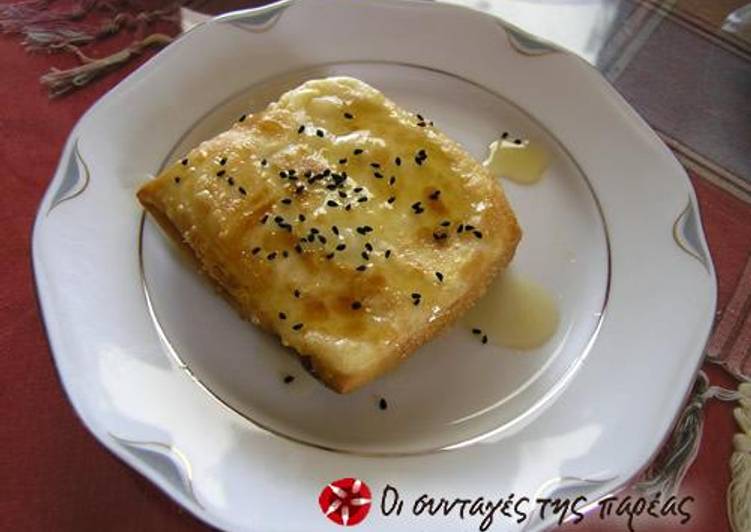 Filo wrapped feta cheese with honey sauce