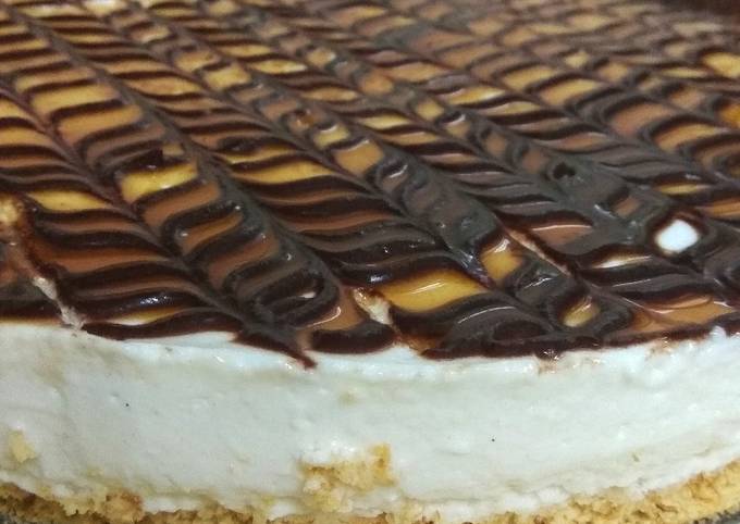 Vanilla cheesecake topped with chocolate and caramel recipe main photo