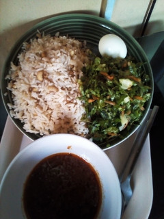 A picture of Rice/Beans Lettuce salad /Crayfish stew & Egg.