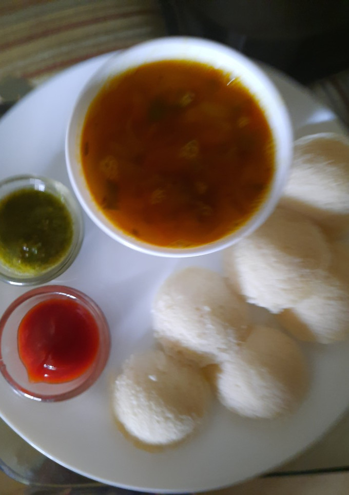 A picture of Rice Idli with Sambhar.