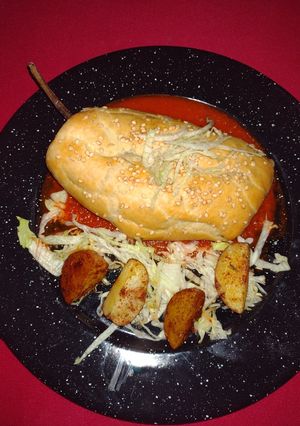 Una foto de Rollo de chile poblano hojaldrado