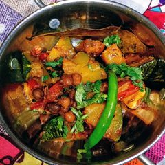A picture of Kaddu Aloo chana Masala.