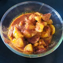A picture of Aloo tinda curry.