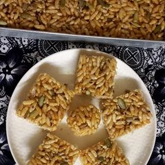 A picture of Pumpkin seeds & puffed rice chikki.