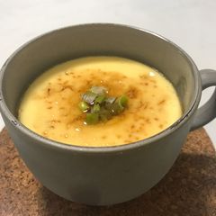 A picture of Steamed egg in a mug.