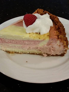 A picture of Striped Fresh Raspberry Cheesecake.