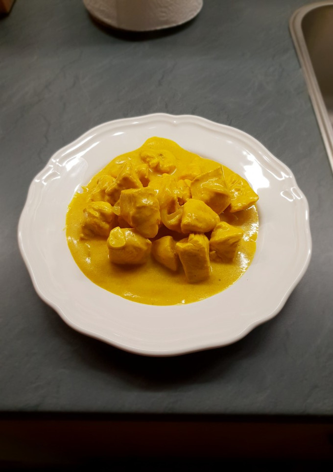 Una foto de Pollo al curry