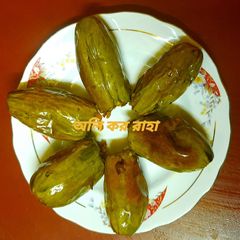 A picture of Stuffed Pointed Gourd (Patol Dorma) in Traditional Bengali Style.