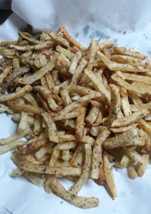 Una foto de Papas fritas con harina y chimichurri 😊😊