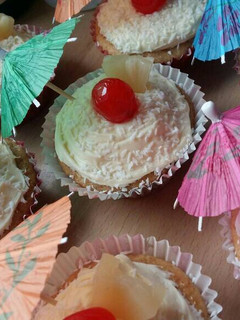 A picture of Vickys Pina Colada Cupcakes, GF DF EF SF NF.