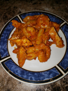 A picture of Tuscan Chicken & Shrimp pasta.