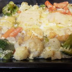 A picture of Smoked Haddock with Smoked Cheese and veg with Lemon cream sauce.