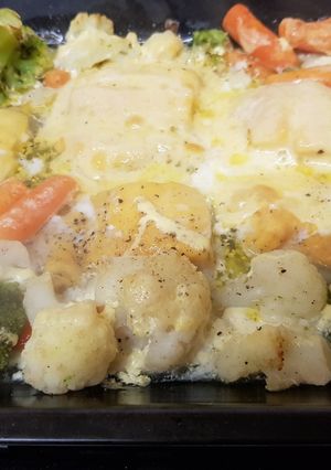 A picture of Smoked Haddock with Smoked Cheese and veg with Lemon cream sauce.