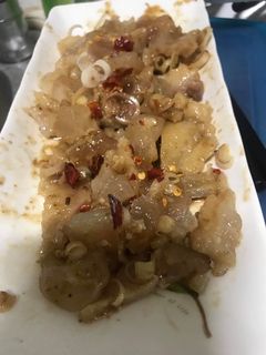 Hình của món Gân bò cay.
