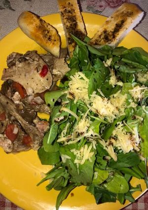 A picture of Arugula Salad with Parmesan and Beef.