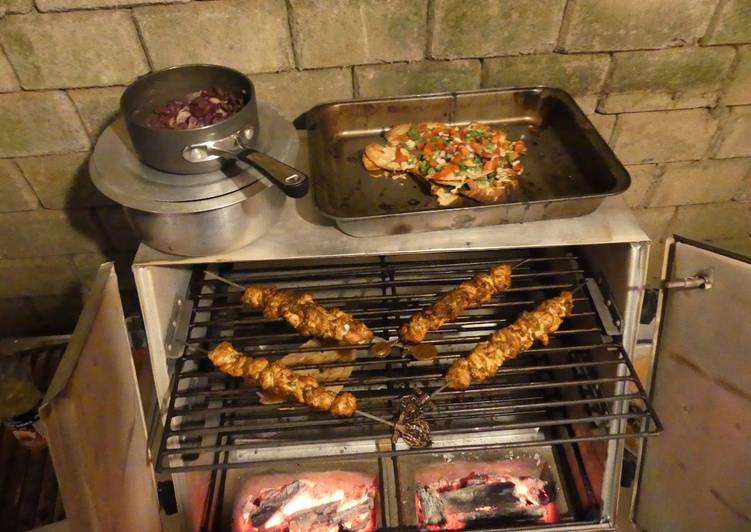 Simple Way to Make Award-winning Chicken satay kebabs and home made pili pili cheesy chapati nachos in the jiko oven :)