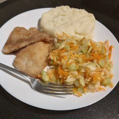 A picture of Mash potatoes, salad n fish fillet.