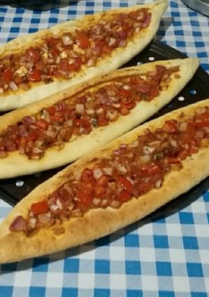 Une photo de Fatayer aux oignons et tomates
