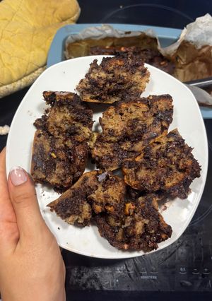 A picture of Banana bread with nutella & chocolate.