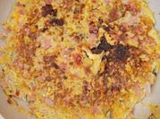 A picture of ham eggs hash browns