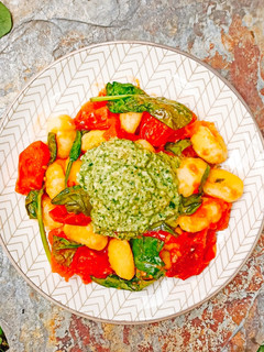 Una foto de Ñoquis con pesto