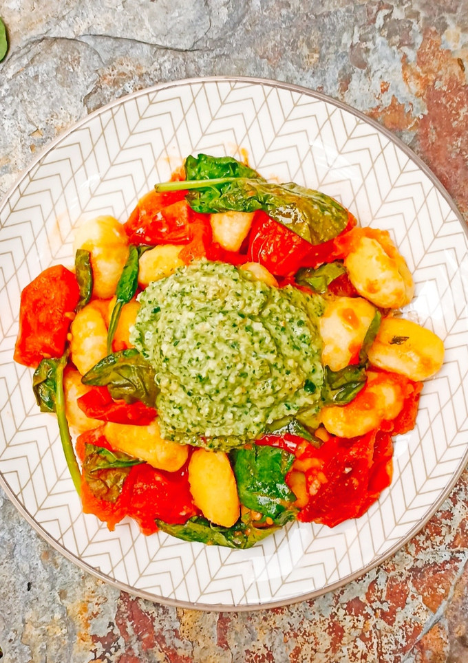 Una foto de Ñoquis con pesto