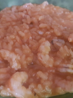 Una foto de Arroz con almejas y gambas