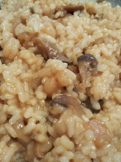 Una foto de Arroz con setas y gambas