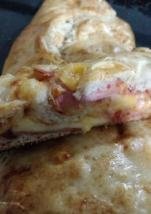 Una foto de Pizza arrollada