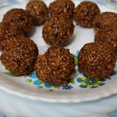 Jaggery sesame seeds peanuts ladoo A picture of Jaggery sesame seeds peanuts ladoo.
