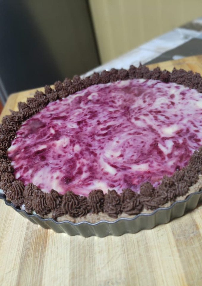 Una foto de Tarta de frambuesas con ganache de chocolate