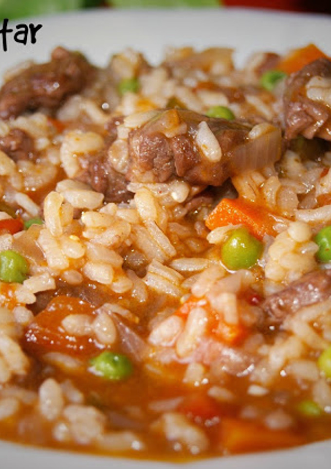 Una foto de Arroz meloso con solomillo ibérico